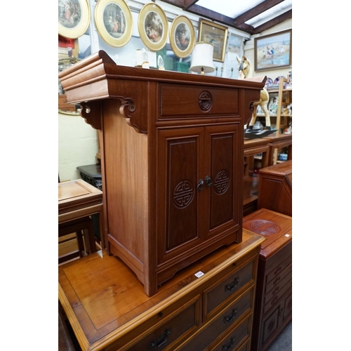 1097 - A Chinese hardwood side cabinet, 73.5cm wide; together with another matching cabinet, fitted for cut... 