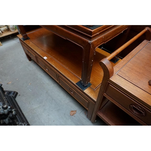 1099 - A Chinese hardwood rectangular low occasional table, with three frieze drawers, 127cm wide. ... 