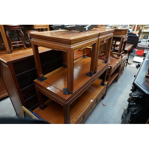 1100 - A Chinese hardwood rectangular low occasional table, 101.5cm wide; together with another pair o... 