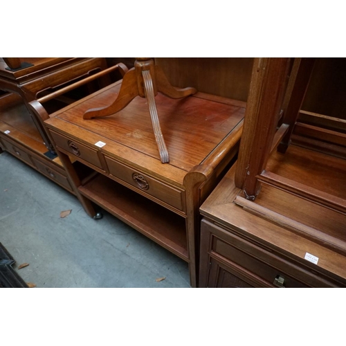 1102 - A Chinese hardwood trolley, with a pair of frieze drawers and platform undertier, 78cm wide; togethe... 