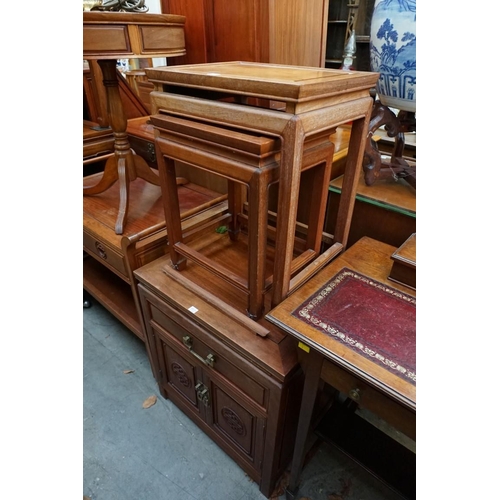 1102 - A Chinese hardwood trolley, with a pair of frieze drawers and platform undertier, 78cm wide; togethe... 