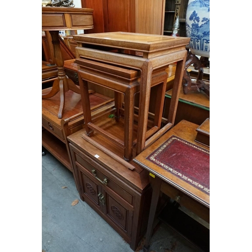 1102 - A Chinese hardwood trolley, with a pair of frieze drawers and platform undertier, 78cm wide; togethe... 