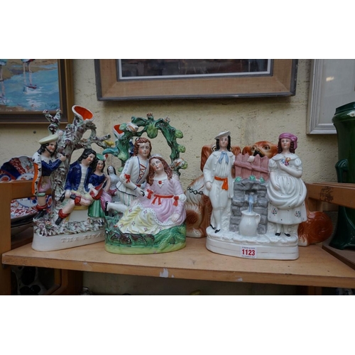 1123 - A collection of Victorian Staffordshire pottery figures, largest 31cm high. (6)... 