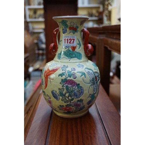 1127 - A collection of famille rose jars and vases, largest 22cm high. (10)