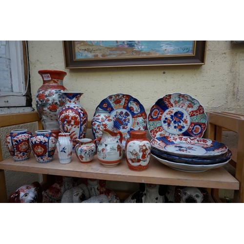 1129 - A collection of Japanese Imari and Kutani porcelain. (15)