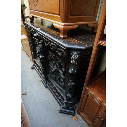 1144 - A late 19th century Flemish style carved and ebonized oak side cabinet, 142cm wide. ... 