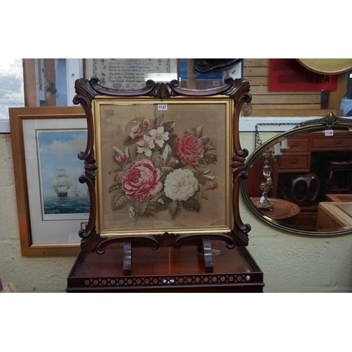 1147 - A Victorian rosewood framed gros point firescreen panel, 60cm wide, on associated stand. ... 