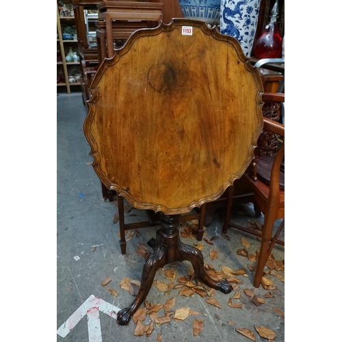 1153 - A late Victorian carved walnut piecrust tilt top tripod table, 59.5cm wide. ... 