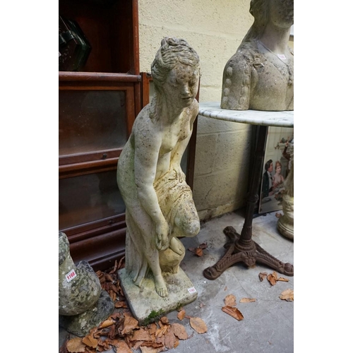 1167 - A composition stone figure of 'Diana after the Bath', 88.5cm high.