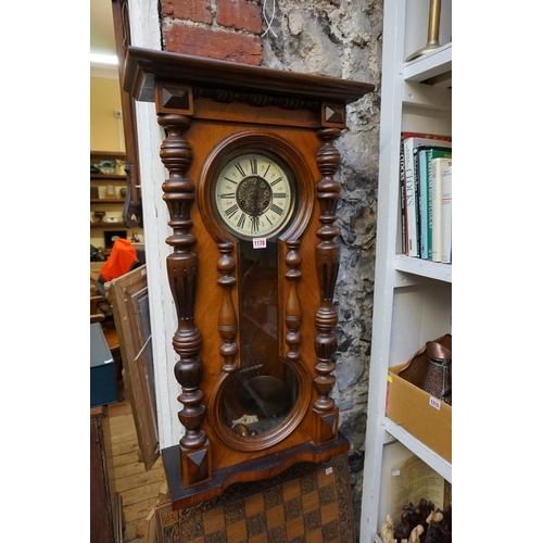 1178 - A late 19th century walnut and beechwood Vienna style wall clock, 108cm high, with pendulum. ... 