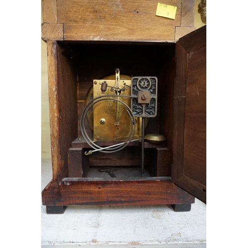 1198 - An early 20th century mahogany mantel clock, 32.5cm high. 