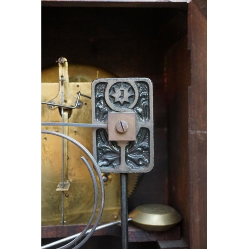 1198 - An early 20th century mahogany mantel clock, 32.5cm high. 