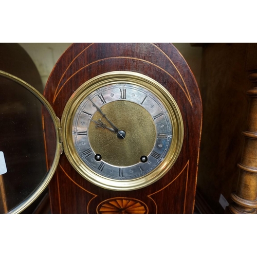 1209 - An antique rosewood and inlaid lancet form mantel clock, 32.5cm high, with pendulum. ... 