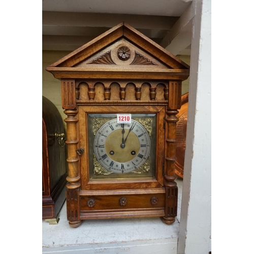 1210 - A late 19th century Continental walnut mantel clock, of architectural form, 43.5cm high, with pendul... 