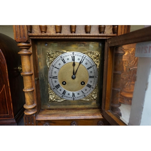 1210 - A late 19th century Continental walnut mantel clock, of architectural form, 43.5cm high, with pendul... 