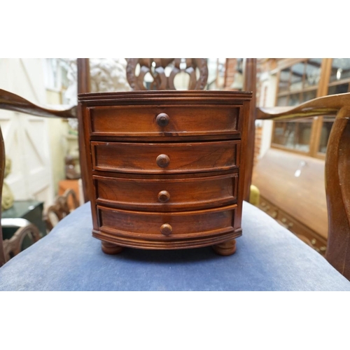 1220 - A miniature hardwood chest of drawers, 22.5cm wide.  