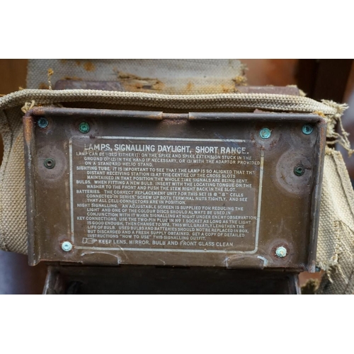 1225 - A World War II military signal lamp, in metal case. 