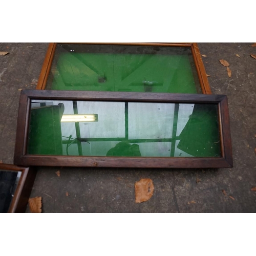 1238 - Three old pistol display cases, each with glass top, 61cm wide. 