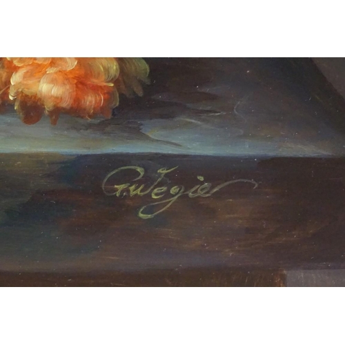 1270 - G Wegier, still life of flowers on a marble ledge, indistinctly signed, oil on panel, 49.5 x 39.5cm.... 