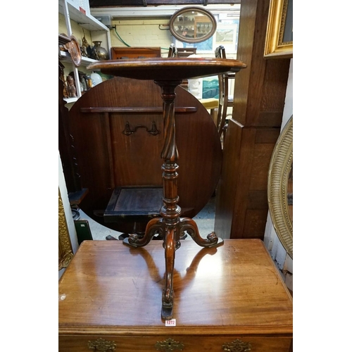 1273 - A Victorian mahogany and walnut crossbanded circular tripod table, labelled 'Manufacturers To Her Ma... 