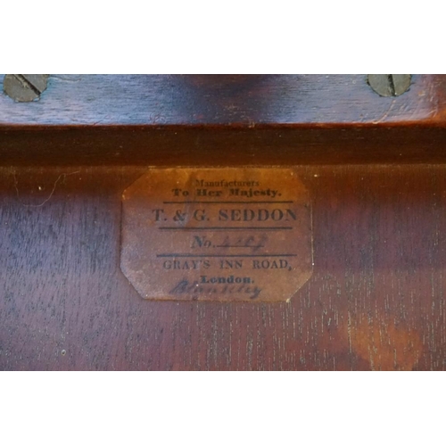 1273 - A Victorian mahogany and walnut crossbanded circular tripod table, labelled 'Manufacturers To Her Ma... 