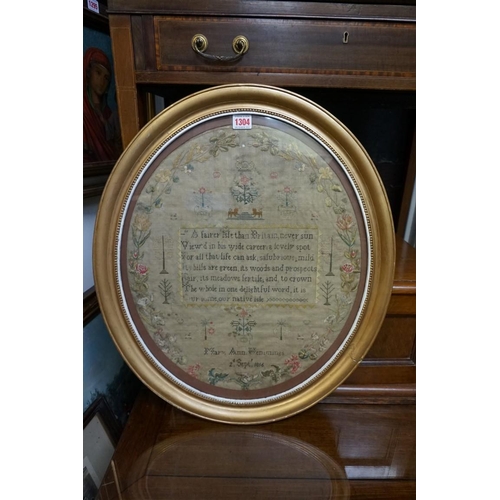 1304 - A George III needlework verse sampler, by 'Mary Ann Hemmings, 2d Sept 1816,' 49 x 42cm oval.... 