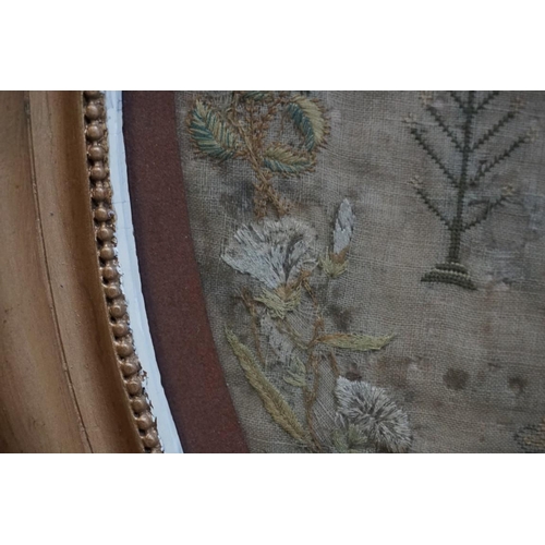 1304 - A George III needlework verse sampler, by 'Mary Ann Hemmings, 2d Sept 1816,' 49 x 42cm oval.... 