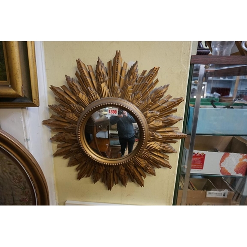 1308 - A vintage gilt starburst wall mirror, 50cm diameter. 