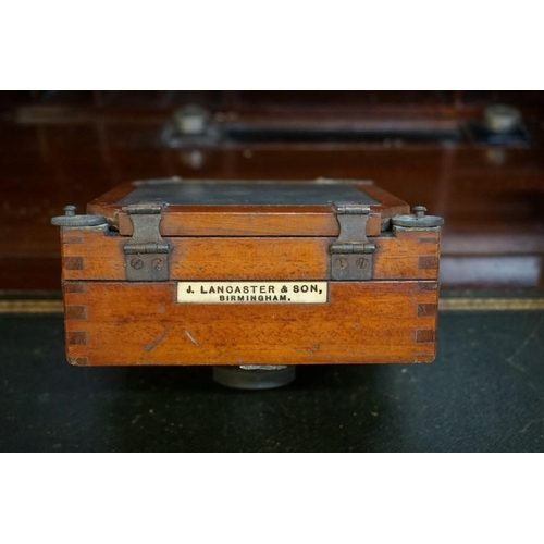 1318 - An antique mahogany plate camera, bearing ivorine label inscribed 'J Lancaster & Son', (incomple... 