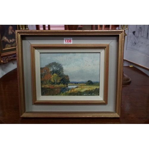 1338 - Norman Battershill, a river landscape, signed, oil on board, 17 x 23cm. 