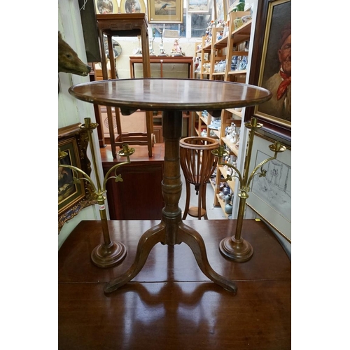 1345 - An antique mahogany circular tilt top tripod table, 58cm wide.