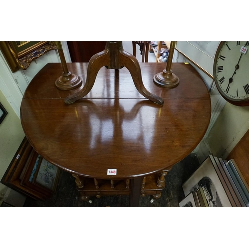 1348 - An 18th century mahogany gateleg table, 106cm wide.