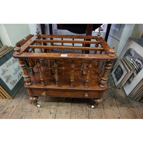 1349 - A Victorian figured walnut Canterbury, with apron drawer, 55.5cm wide.