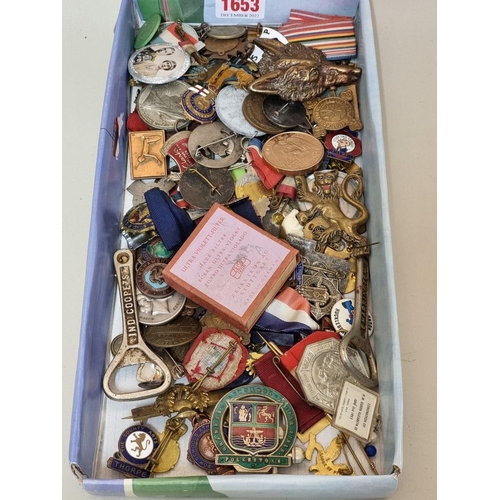 1653 - A collection of badges, medals and related. 