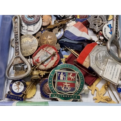 1653 - A collection of badges, medals and related. 