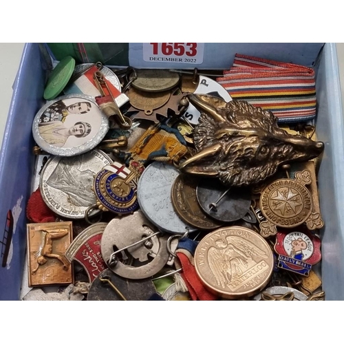 1653 - A collection of badges, medals and related. 