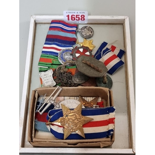 1658 - Medals: a World War II group to N Evans, RAF, Service No.1645997, in original postal box; together w... 