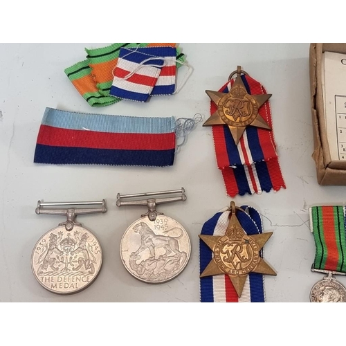 1658 - Medals: a World War II group to N Evans, RAF, Service No.1645997, in original postal box; together w... 