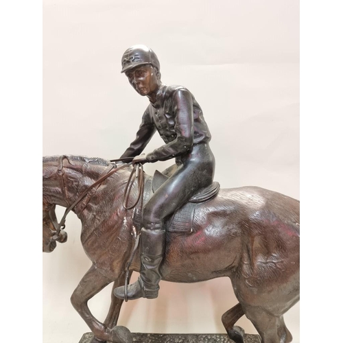 1675 - A large bronze figure group of a horse and jockey, 54cm high. 