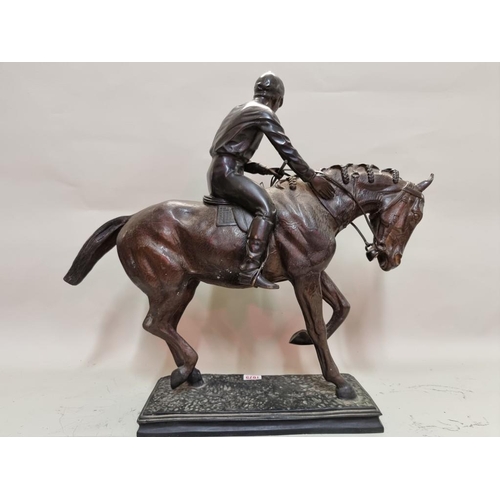 1675 - A large bronze figure group of a horse and jockey, 54cm high. 