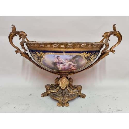 1679 - A large and impressive 19th century Sevres style and gilt bronze mounted twin handled centrepiece, p... 