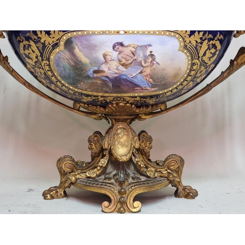 1679 - A large and impressive 19th century Sevres style and gilt bronze mounted twin handled centrepiece, p... 