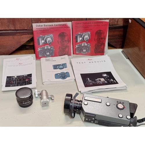 1684 - Cameras: a Leicina Super RT1 8mm film camera, with instructions and original case; together with a f... 