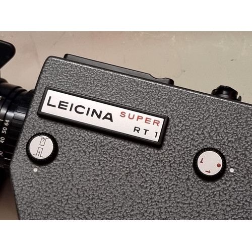 1684 - Cameras: a Leicina Super RT1 8mm film camera, with instructions and original case; together with a f... 