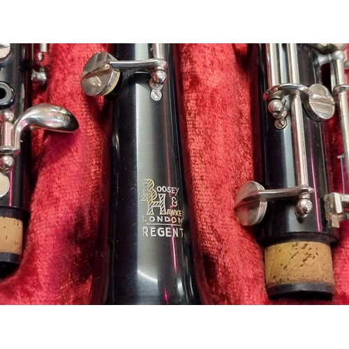 1686 - Two old clarinets, to include a Boosey & Hawkes example, each in case. 