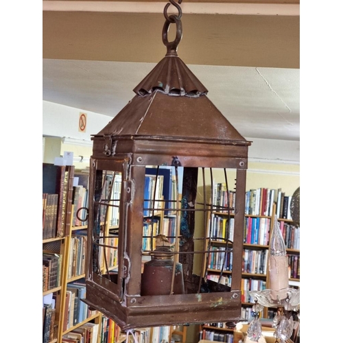 1688 - An old brass hanging lantern, 42cm high. 