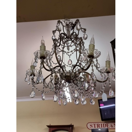 1689 - An old gilt metal and facetted bead drop six branch chandelier, 57cm high.