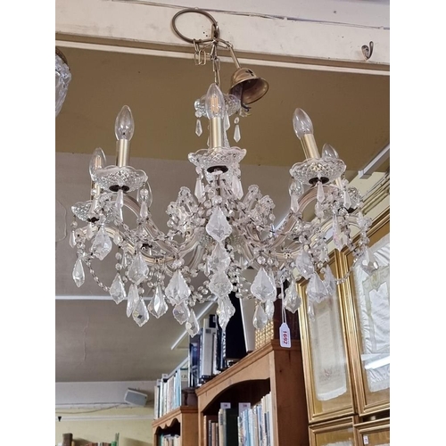 1692 - A facetted glass drop eight branch chandelier, approx 48cm high.