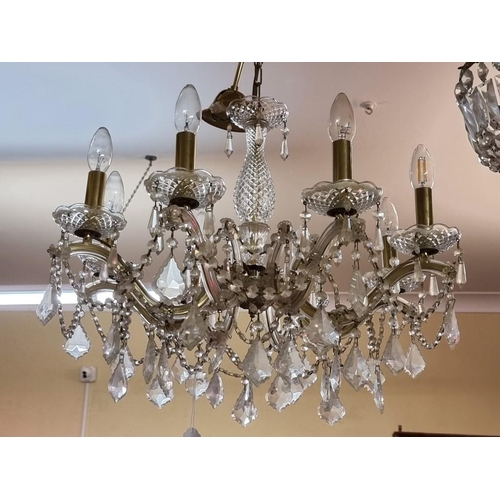 1692 - A facetted glass drop eight branch chandelier, approx 48cm high.