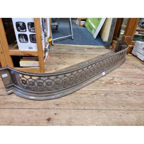 1703 - A Georgian steel fire kerb, 131cm wide. 